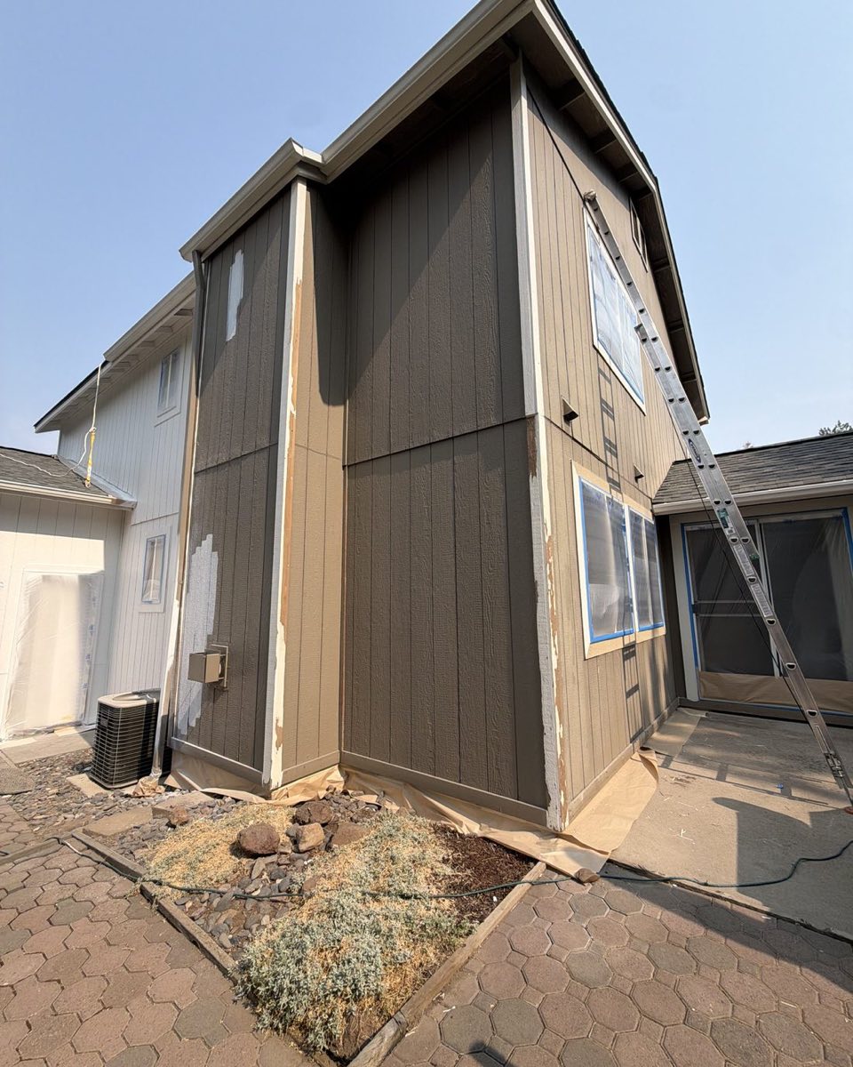 A Central Oregon home masked and prepped by Keystone Painting LLC before an exterior repaint